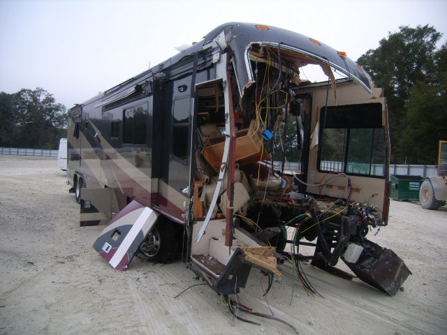 Name:  Wasted Front Damaged RMR Monocoque Motorhome Passenger Side.JPG
Views: 596
Size:  94.3 KB